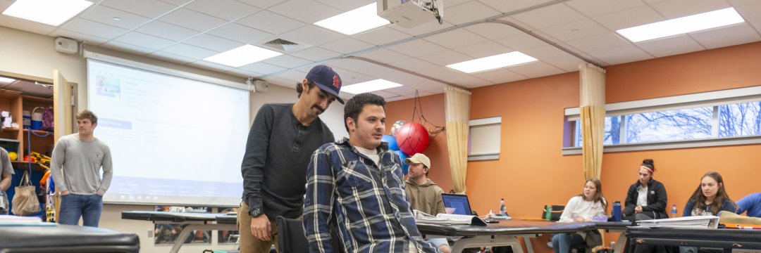 Students use Wheelchair in Physical Therapy Lab 0557