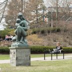 Campus Scenic Spring - Students work near statue